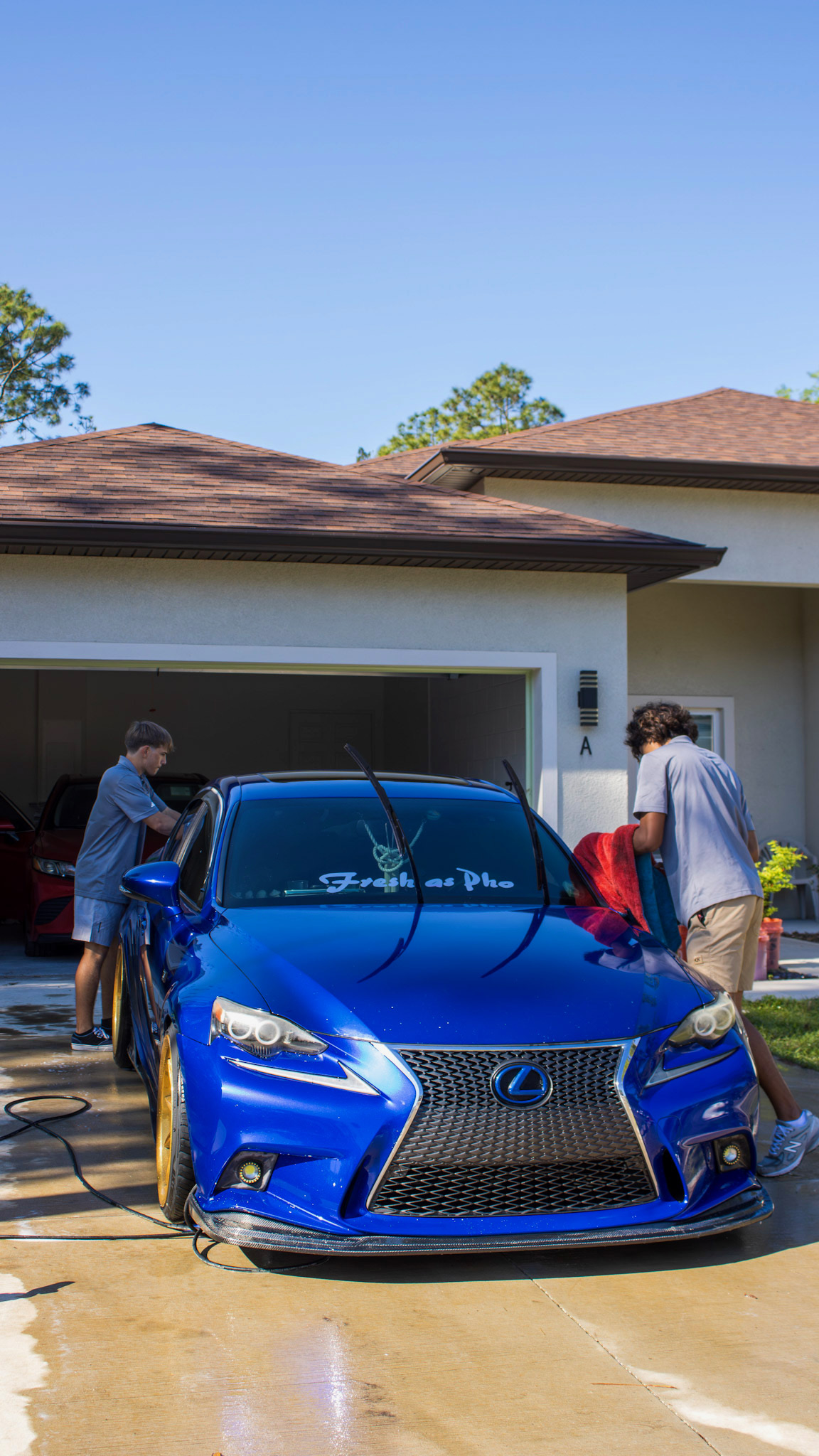 Team detailing Lexus IS